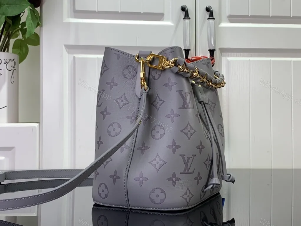 View 9 of Chic Monogram Bucket Bag: Gray Leather, Chain Accent, Versatile Luxury