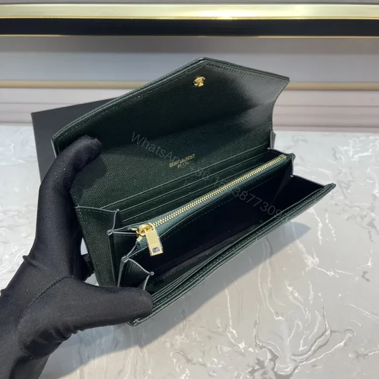 View 9 of Emerald Chevron Leather Wallet by YSL, Compact Luxury