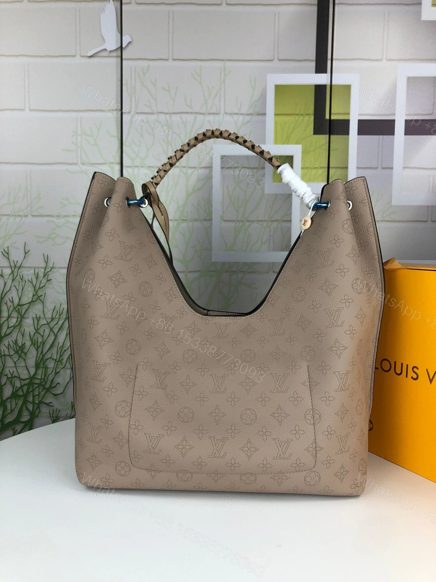 View 35 of Louis Vuitton Carmel Hobo Bag ‘Mouse Grey’