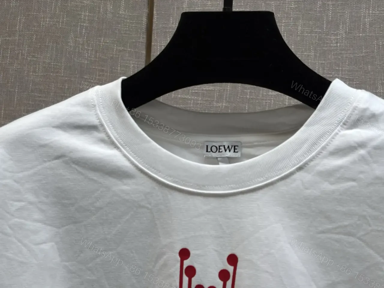 View 2 of Casual Luxe Tee: White Cotton, Oversized LOEWE Graphic