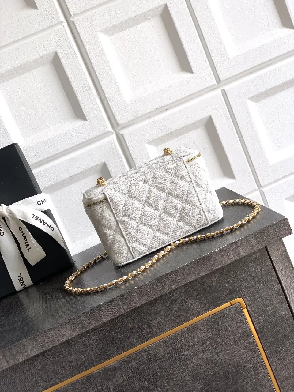 View 7 of white quilted leather bag with chain strap for everyday luxury