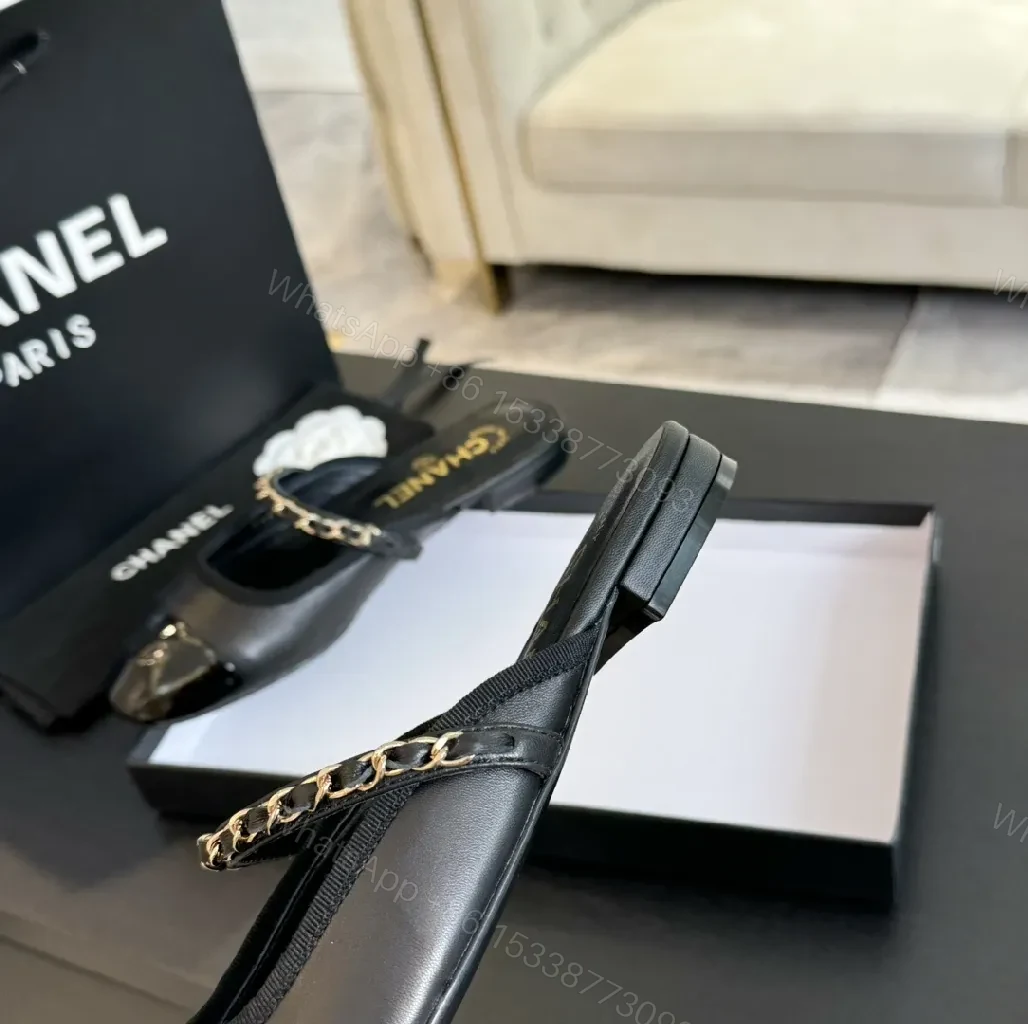 View 8 of Black Leather Slide Mules with Chain Detail - Luxe Casual Calm