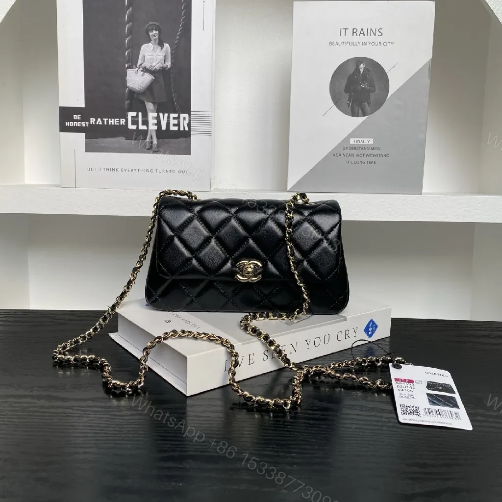 Quilted Black Flap Bag with Gold Chain Strap, Compact, Elegant — view 1