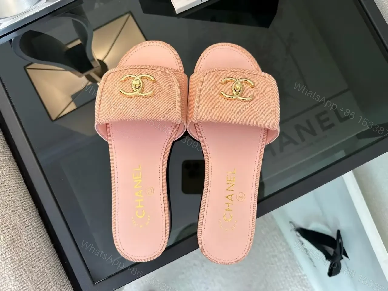 View 5 of Soft Pink Slip-On Sandals with Gold Logo – Luxury Comfort