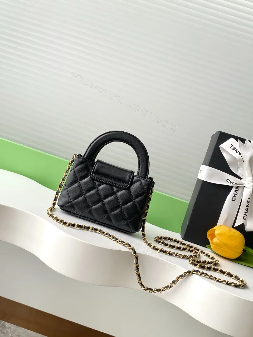 View 7 of Black Quilted Mini Handbag with Gold Hardware, Chain Strap