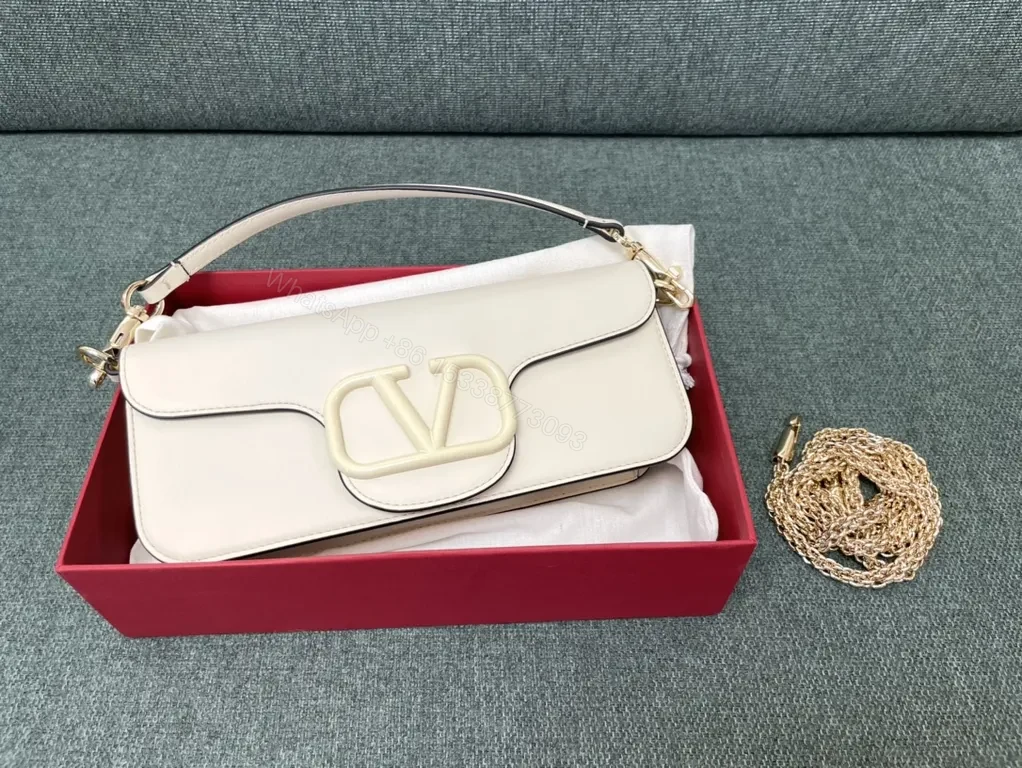 View 5 of Bold Red Leather Bag with Signature V Buckle - Luxury Crossbody