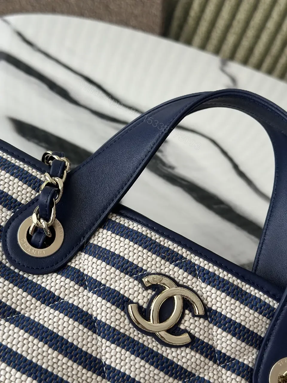 View 6 of Navy Stripe Woven Tote Bag with Leather Accents and Chanel Logo