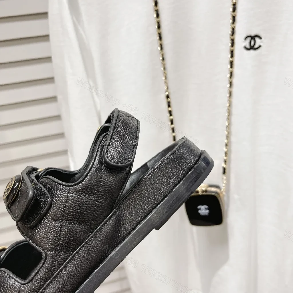 View 6 of Chic Black Leather Sandals with Signature Hardware