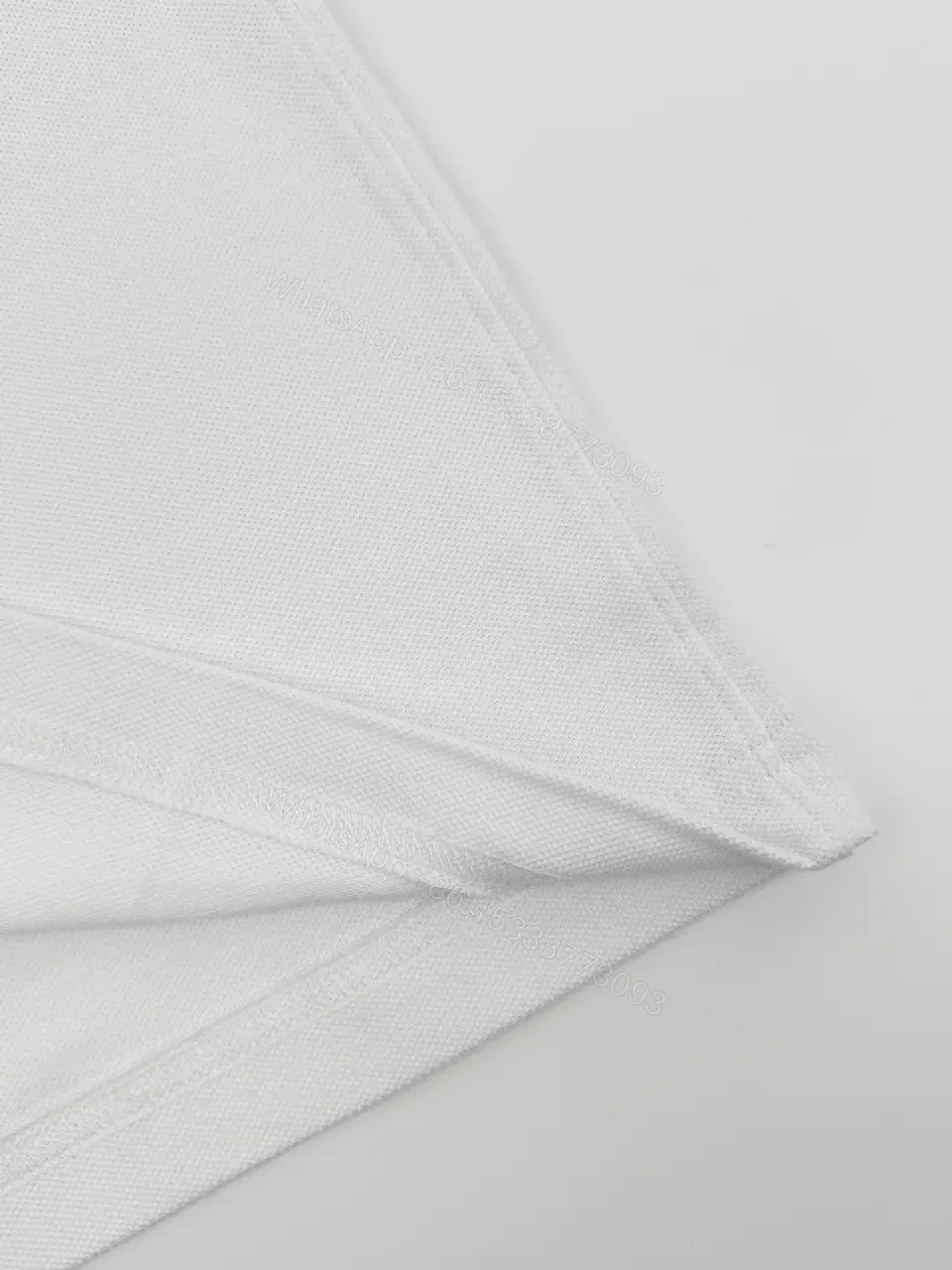View 8 of Premium Cotton Tee: Minimalist White Crew Neck with Metallic Badge