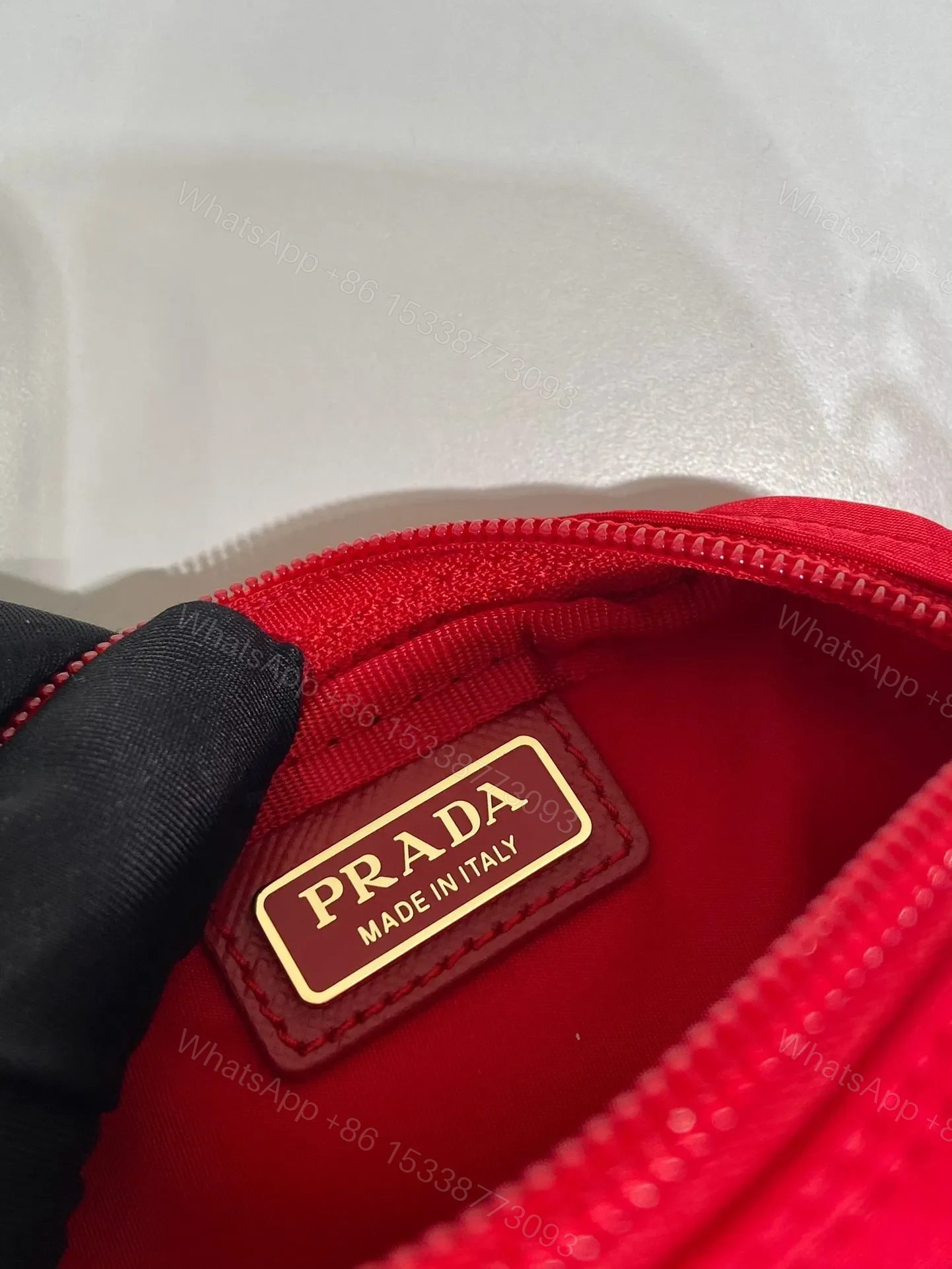 View 5 of CLUTCH 12 IN PASSION RED RE-NYLON