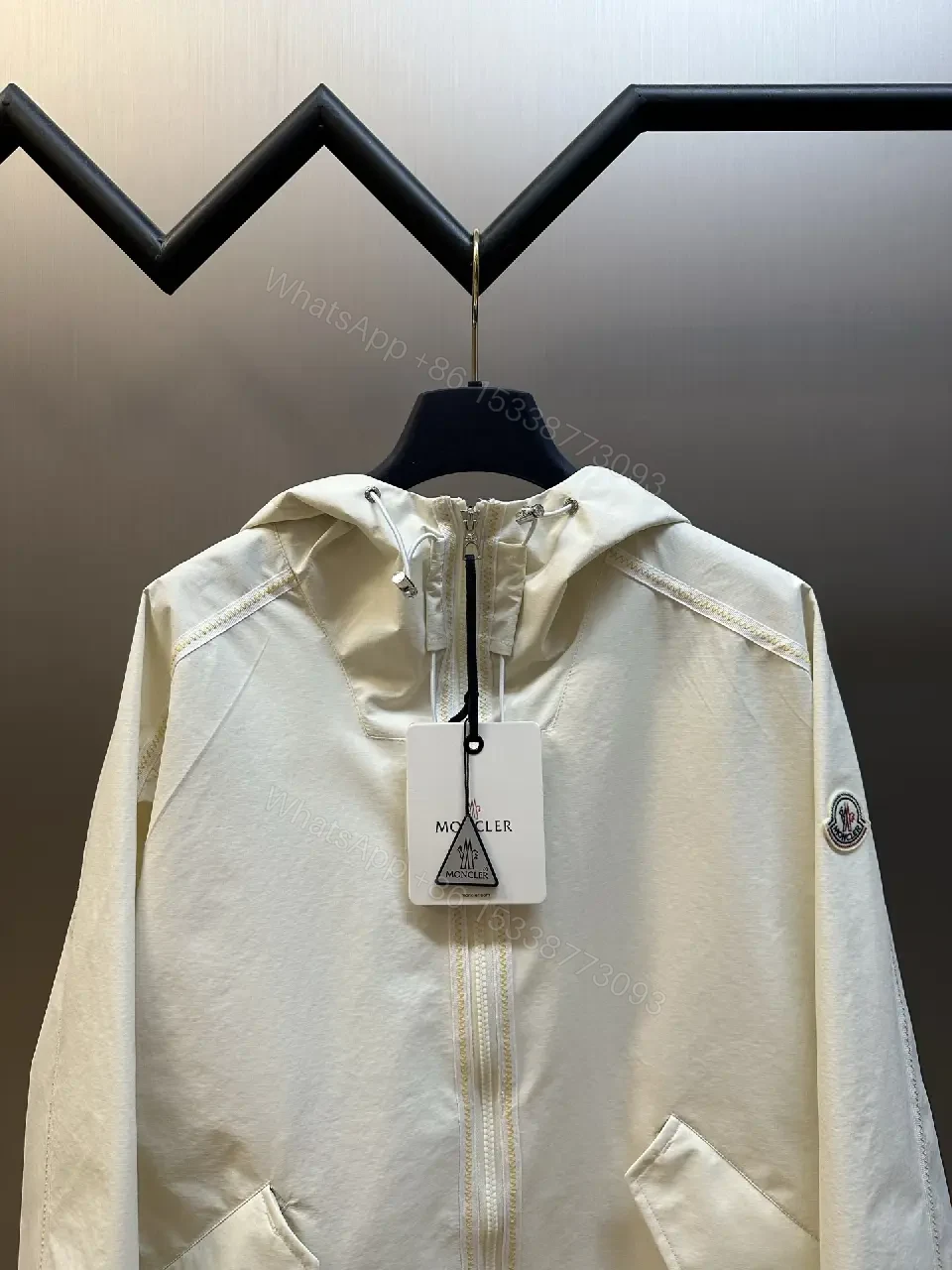 View 9 of Cream nylon lightweight hooded jacket with premium comfort for everyday luxury