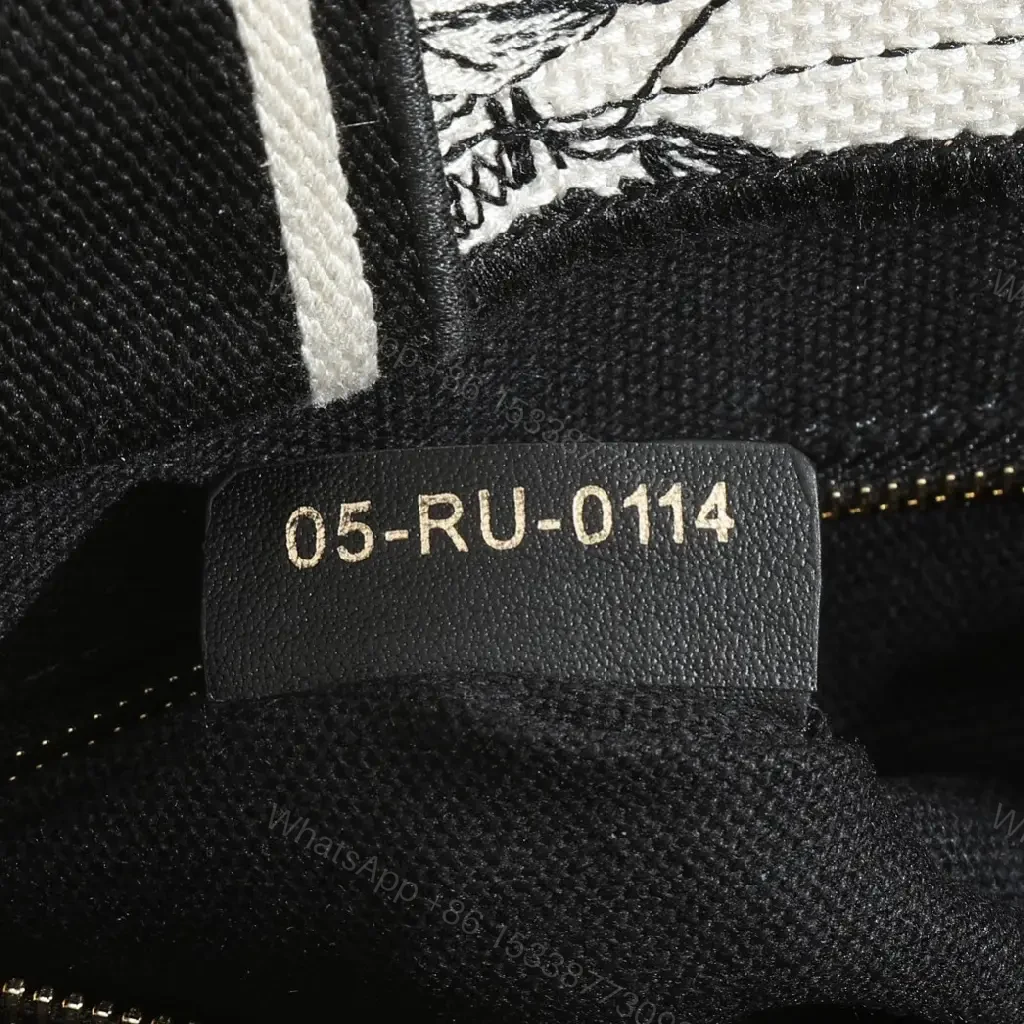 View 10 of Bold Black-White Tote: Structured, Crossbody-Ready Design