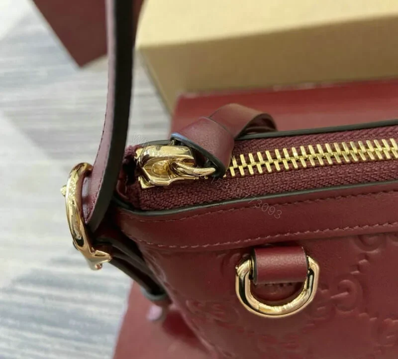 View 6 of Gucci GG Emblem Small Shoulder Bag – Rosso Ancora Red Leather