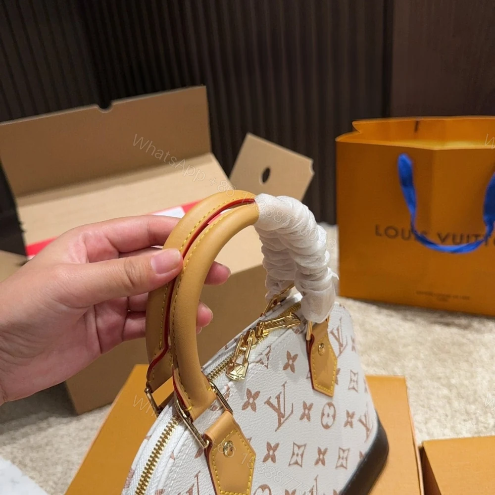 View 5 of Louis Vuitton Nano Alma Other Monogram Canvas Dune 23Cm M46895