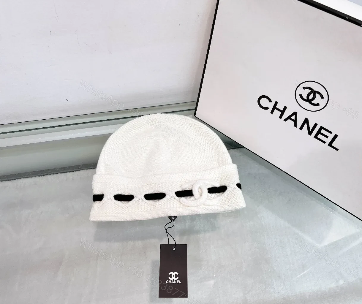 View 2 of Textured Knit Beanie: Luxe Strap Detail, Everyday Chic, Beanie