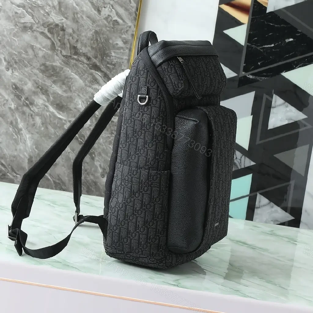 View 5 of Monogram Texture Compact Luxury Backpack - Day-to-Night Utility