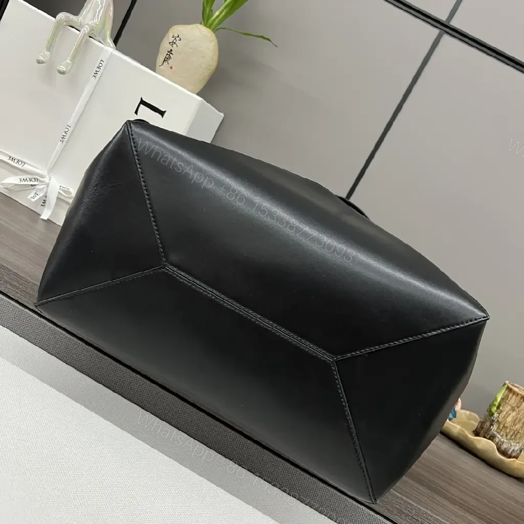 View 7 of Black Leather Structured Tote with Geometric Panels & Gold LOEWE Logo