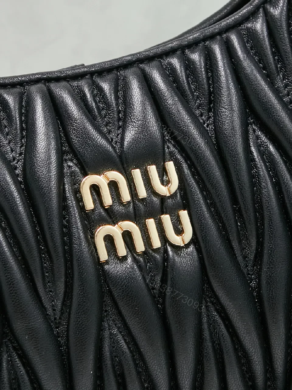 View 3 of Quilted Mini Bag: Gold-Tone Hardware, Leather, Chic Evening Luxury
