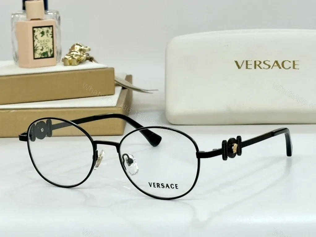 Refined Round Eyewear: Luxury Metal Frames with Signature Detail — view 1