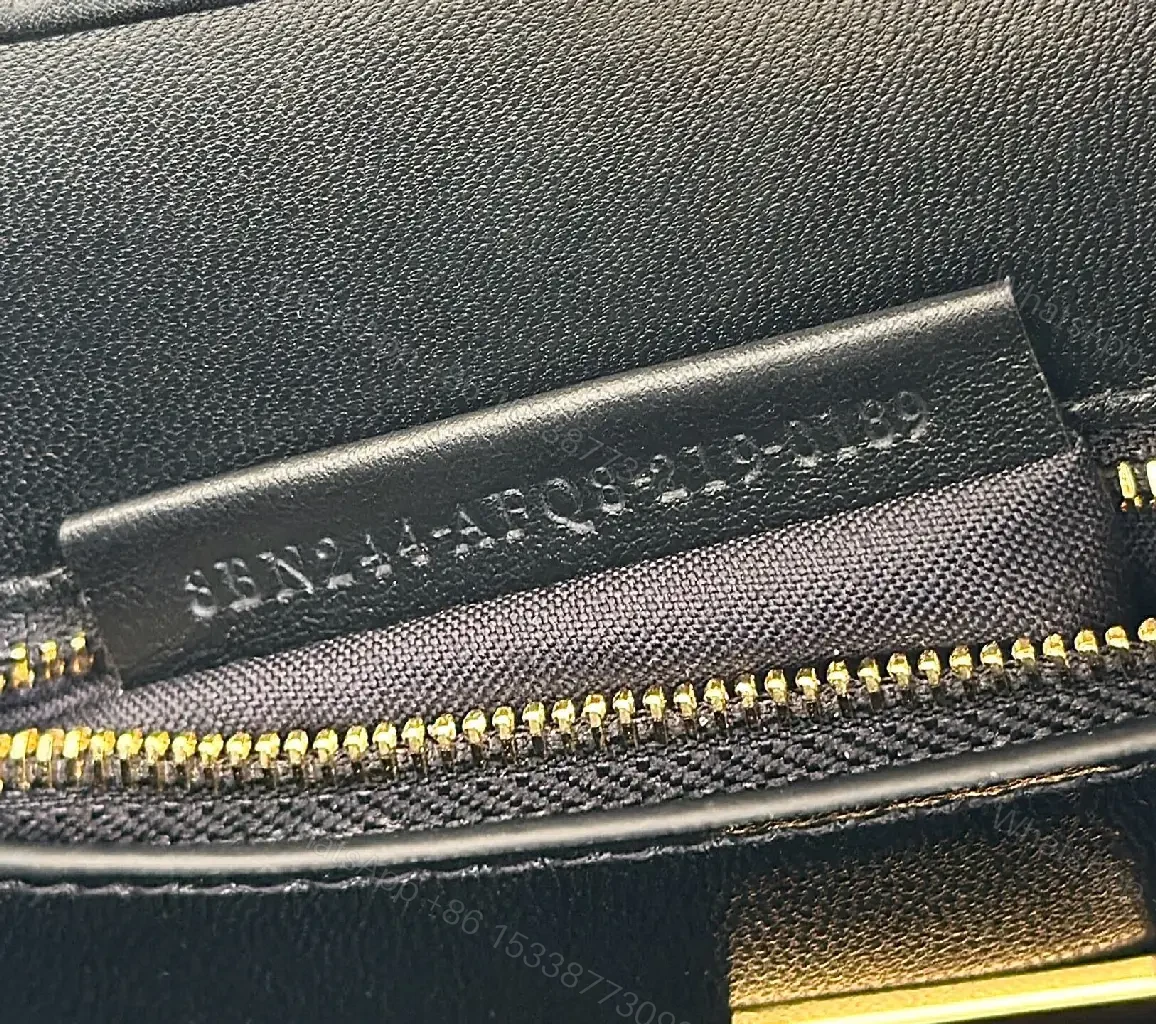 View 9 of Chic Black Leather Satchel: Structured, Versatile Luxury Bag