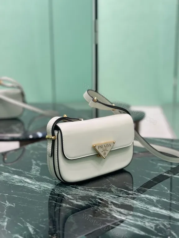 View 6 of Elegant Leather Crossbody Bag: Prada Triangle, Structured Luxury
