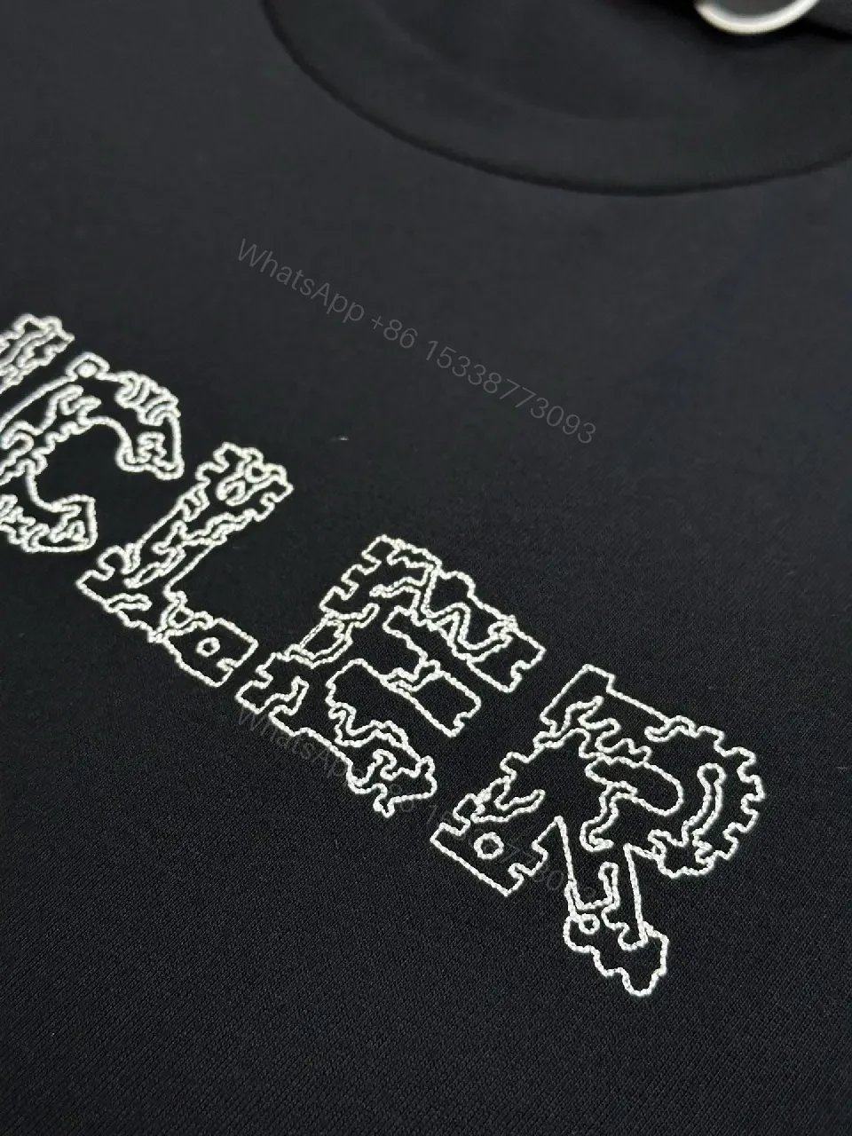 View 8 of Textured Logo Black Tee with Subtle Hardware - Premium Cotton Blend