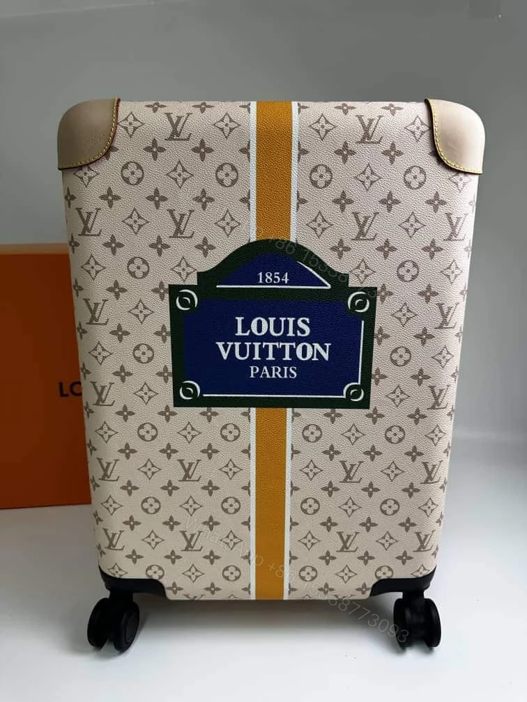 View 2 of Louis Vuitton Horizon 55 Suitcase Coated Canvas Saffron 55Cm M10280