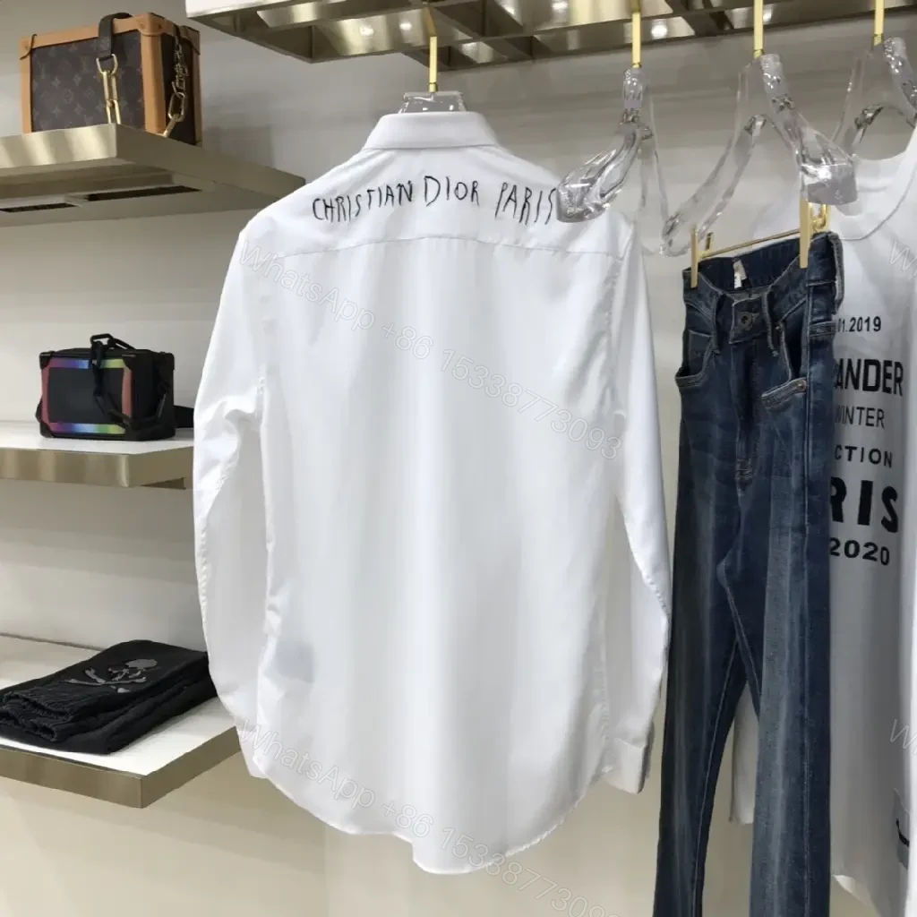 View 2 of White Cotton Shirt with Minimal Dior Emblem, Relaxed Fit, Crisp Look