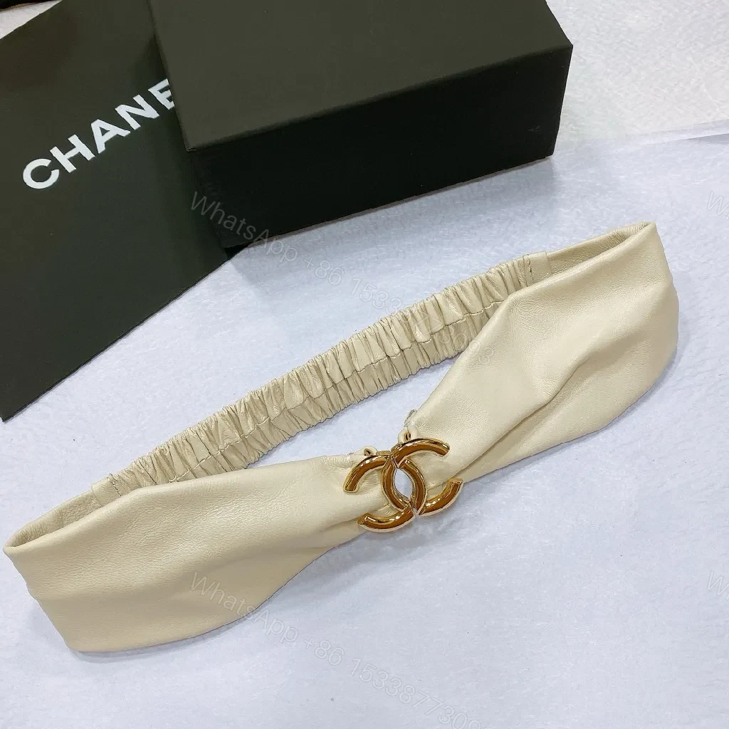 View 5 of Ivory Faux Leather Headband with Gold Logo Emblem - Chic, Everyday Glam
