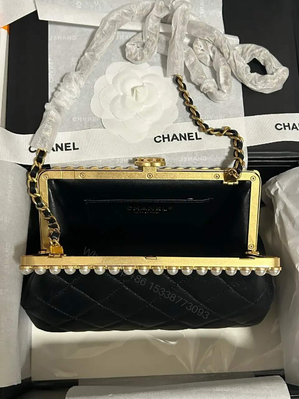 View 2 of Black Quilted Leather Clutch with Pearl Trim, Gold Frame, Elegant