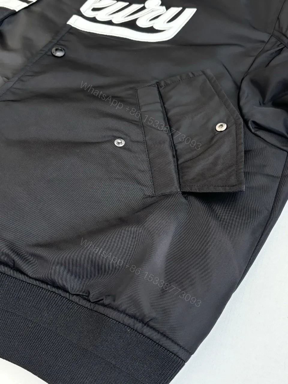 View 9 of Bold Black Logo Varsity Jacket | Luxe Streetwear Outerwear