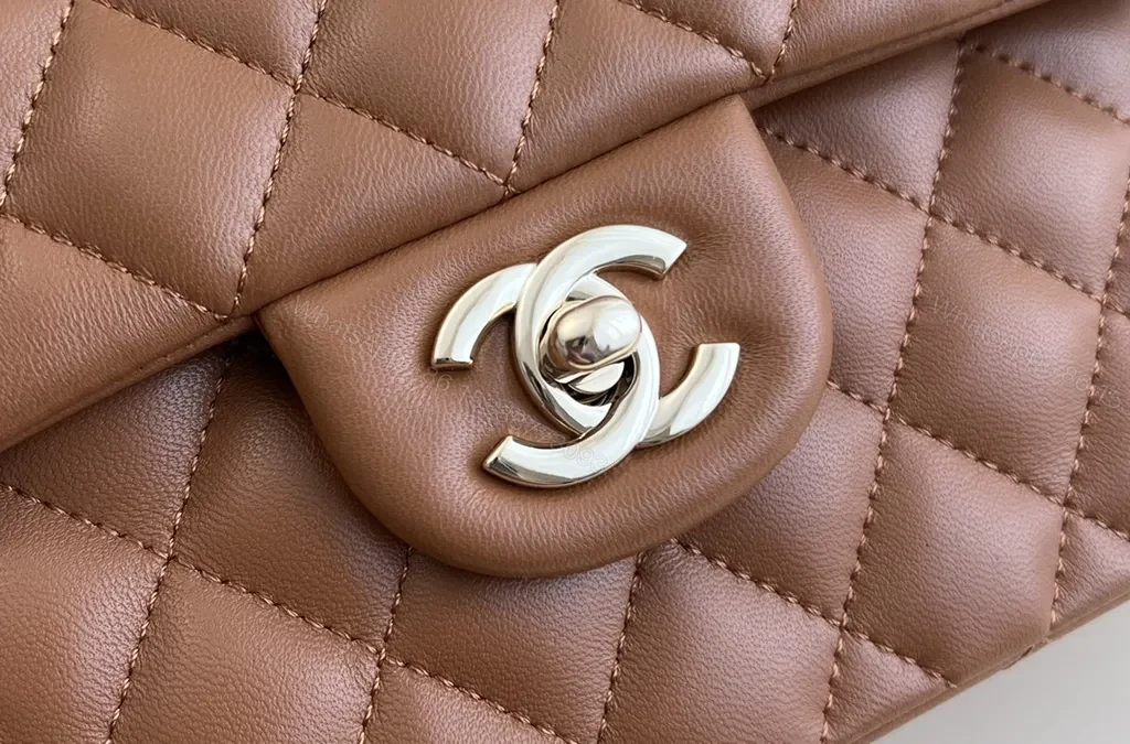 View 9 of Textured Quilted Saddle Bag with Signature Hardware - Brown Leather