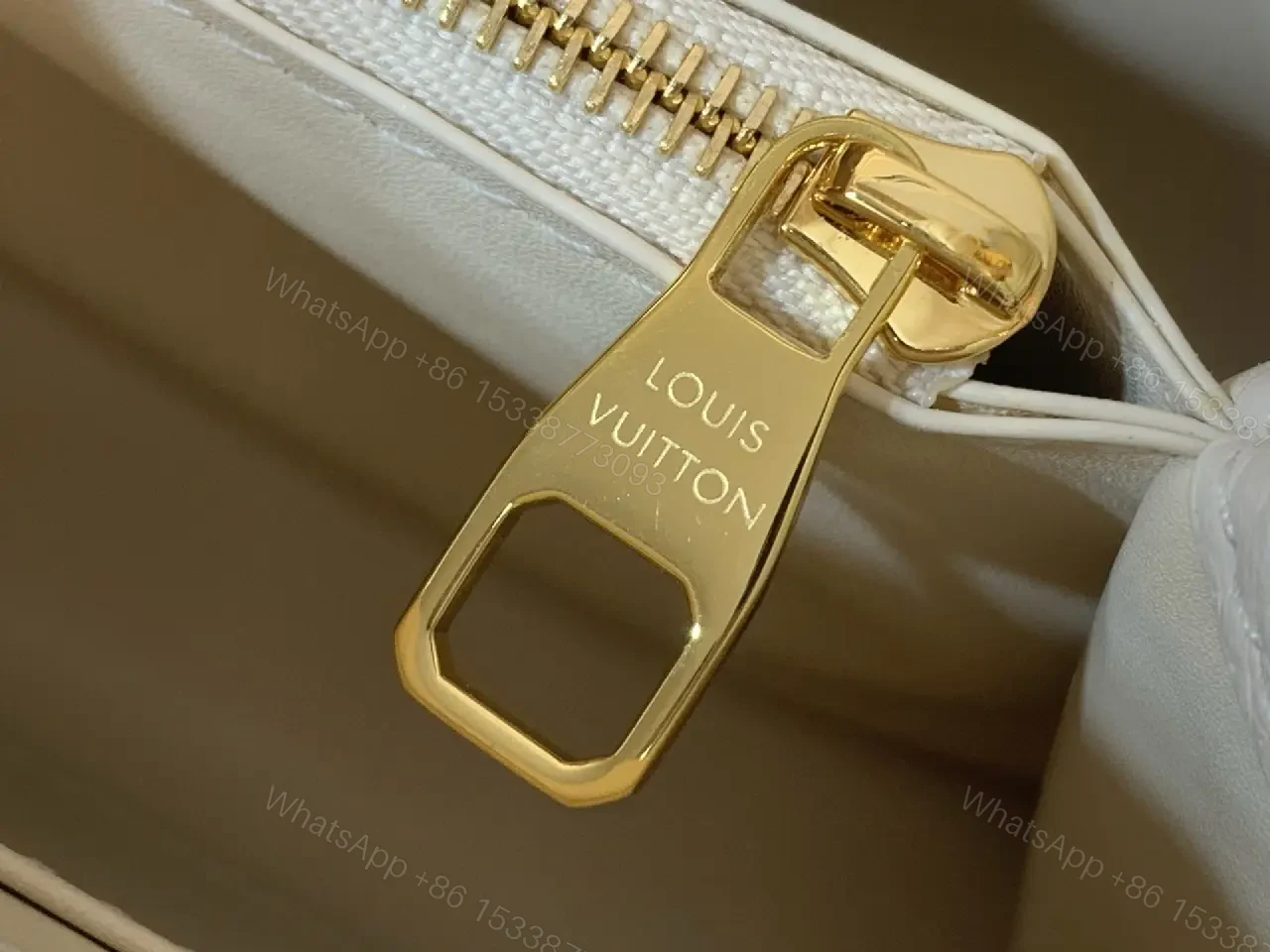 View 12 of Chic Textured Leather Mini Bag with Gold Emblem