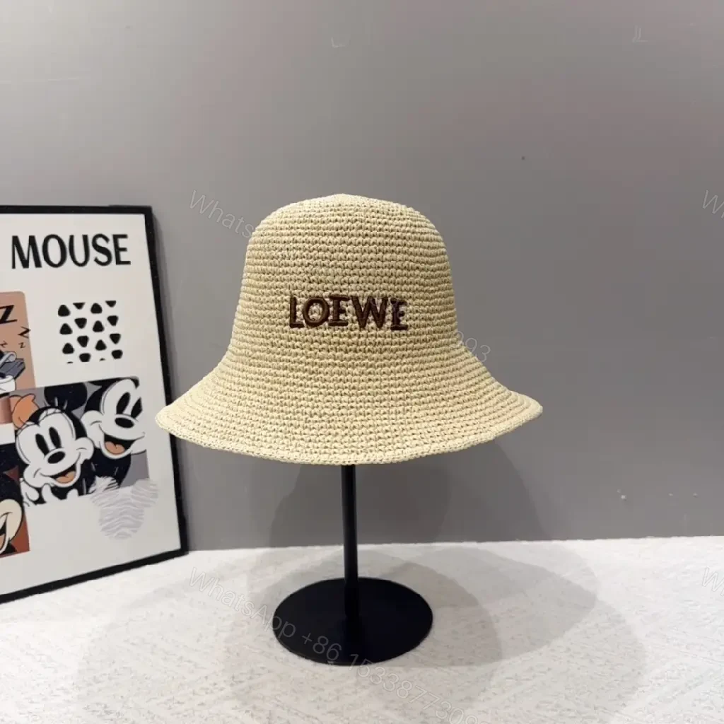 View 4 of Natural Straw Bucket Hat with LOEWE Embroidery