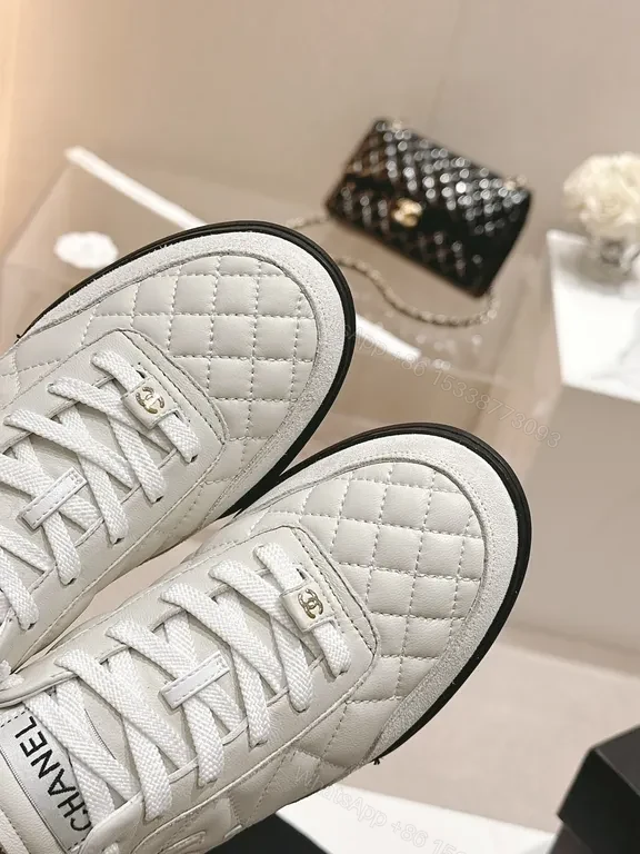 View 5 of White Quilted Platform Sneakers with Chanel Detailing