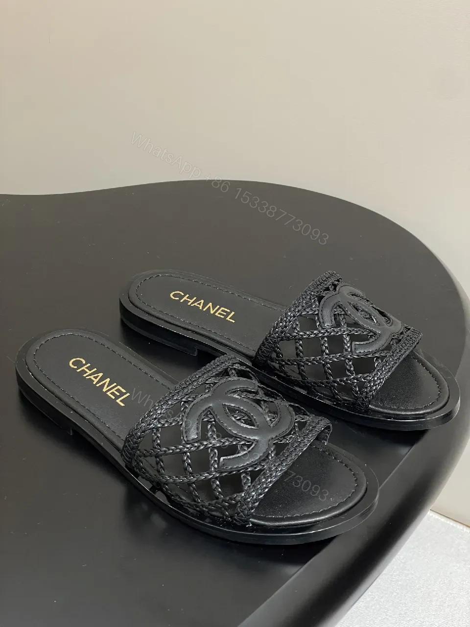 Black Quilted Slide with Interlock Crest - Elevated Comfort Slipper — view 1