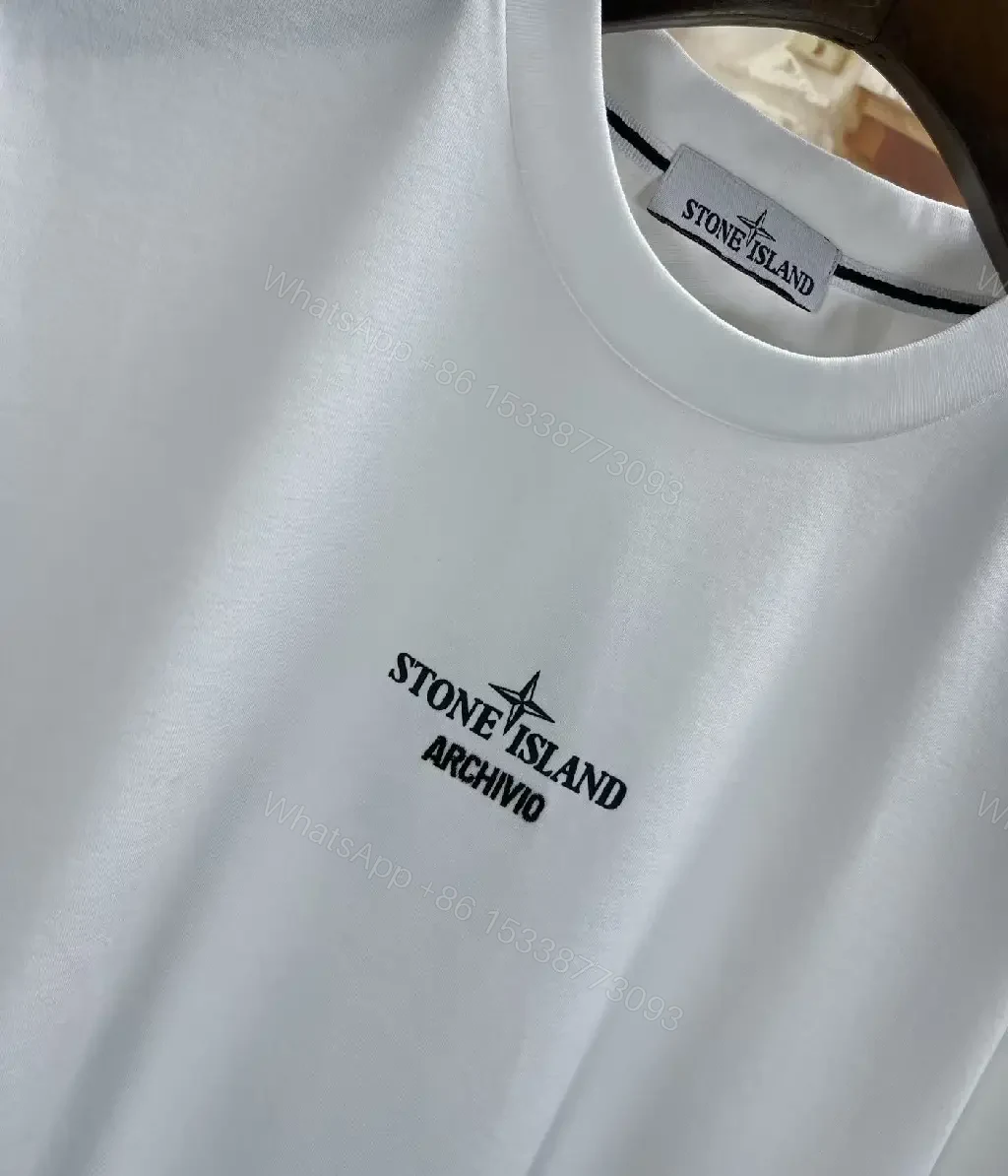 View 6 of Minimalist White Tee with Subtle Logo – Premium Everyday Comfort