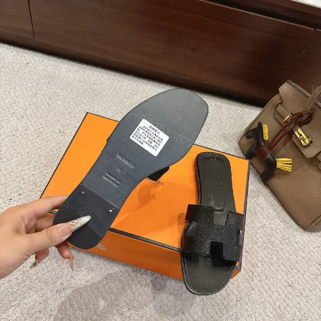 View 2 of Black Leather Minimalist Slides with Signature Cross‐Band