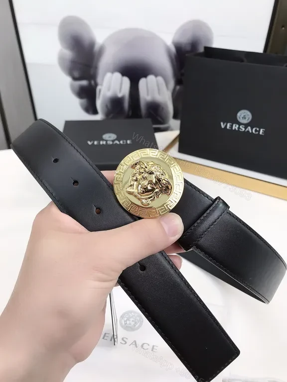 View 2 of Bold Medusa Buckle Belt: Luxury Black Leather Accessory