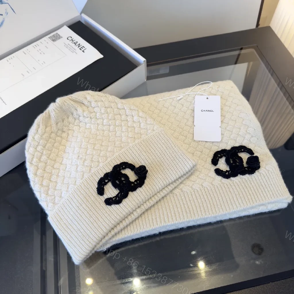 Ivory Knit Set: Textured Luxury with Iconic Emblem — view 1