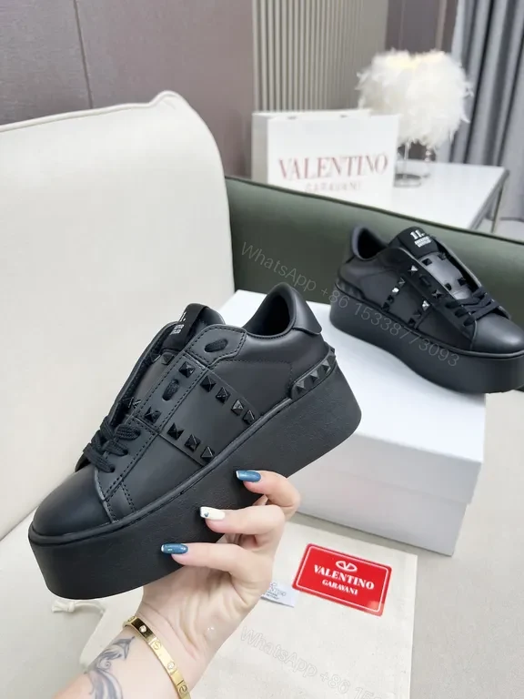 View 7 of Valentino Garavani Black Leather Studded Luxury Sneakers