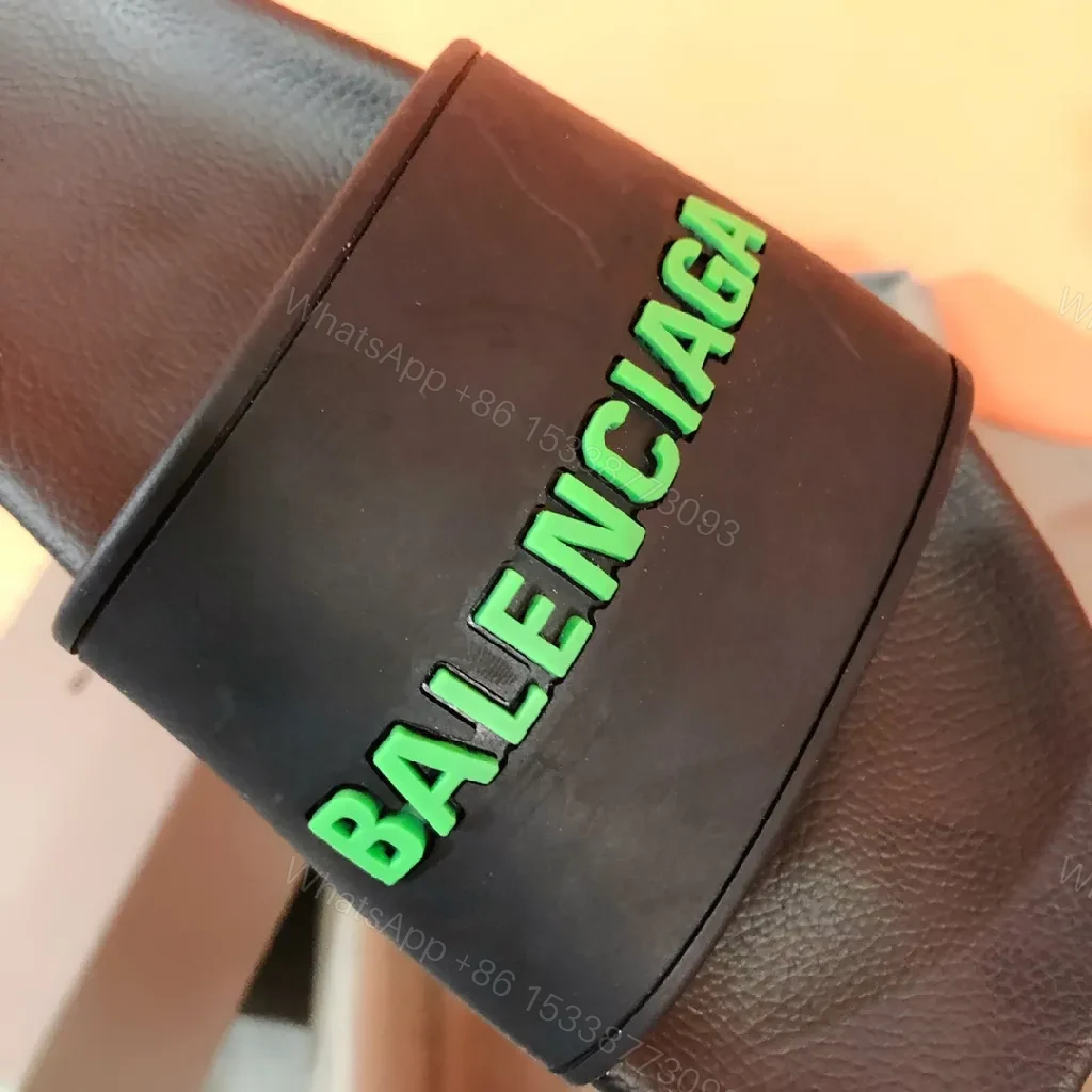 View 3 of Bold Neon Logo Slides: Black Comfort, Statement Style