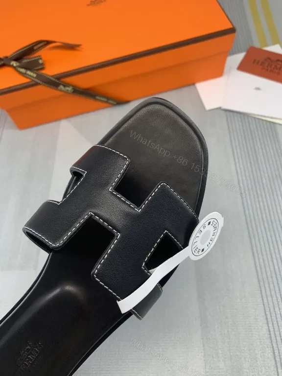 View 2 of HermÃ ̈s Oran Sandals Black Calfskin â€“ Minimalist H-Strap Luxury