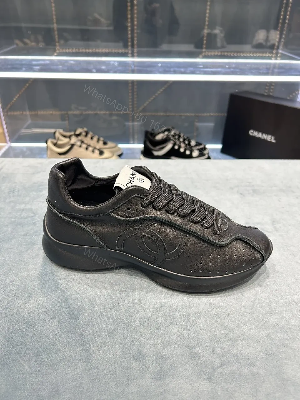 View 6 of Black Leather-Trim Sneaker with Perforations + Luxe Casual Sneakers