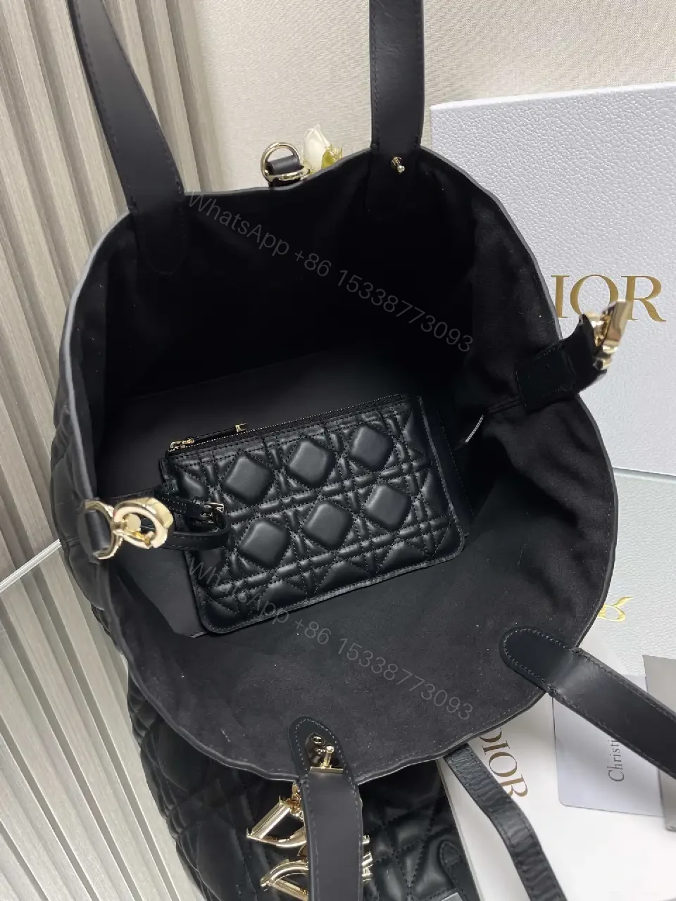View 9 of Black Quilted Tote with Gold Charm – Luxury Everyday Bag