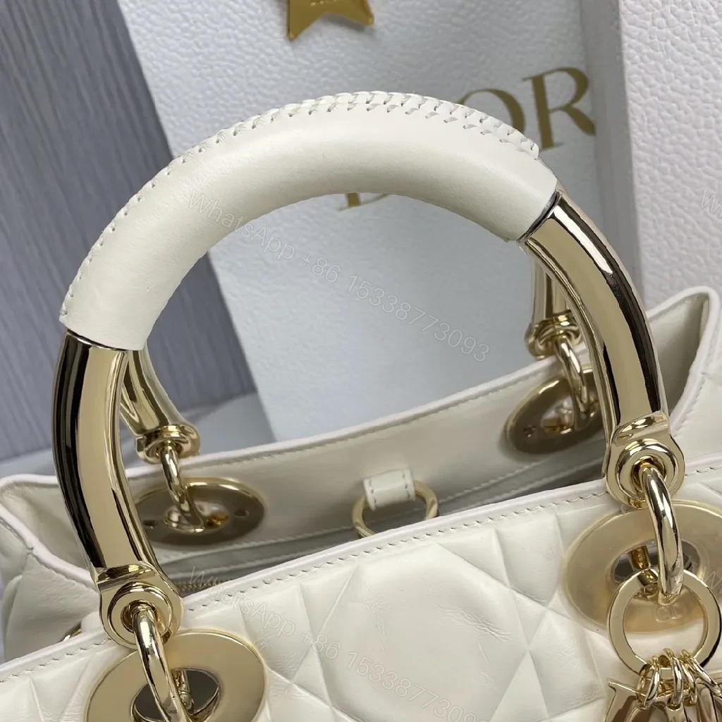 View 8 of Ivory Faux Leather Quilted Satchel with Signature Charms