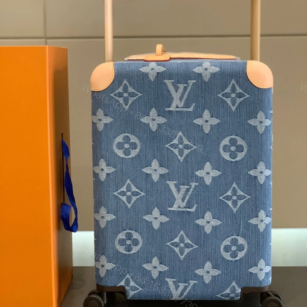 View 2 of Louis Vuitton Horizon 55 Suitcase Monogram Cotton Canvas Denim Blue 55Cm M24314