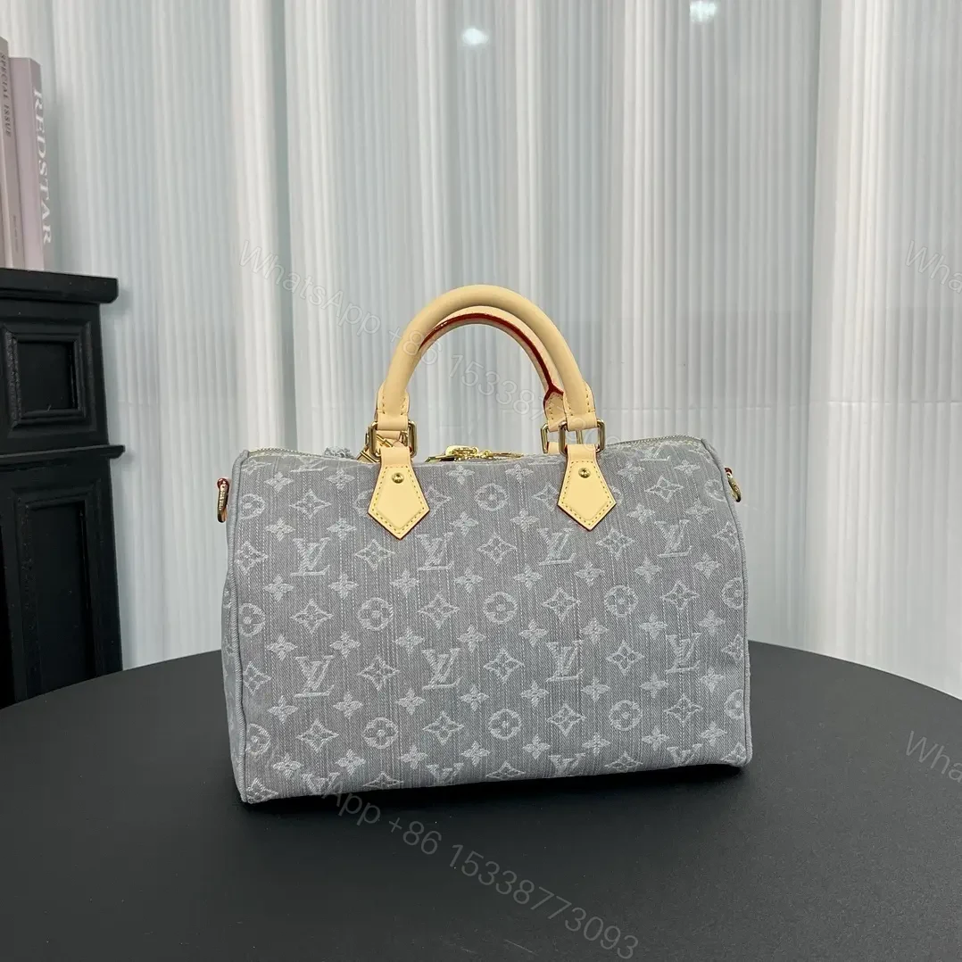 View 4 of Louis Vuitton Speedy Soft 30 bag in Monogram Denim canva
