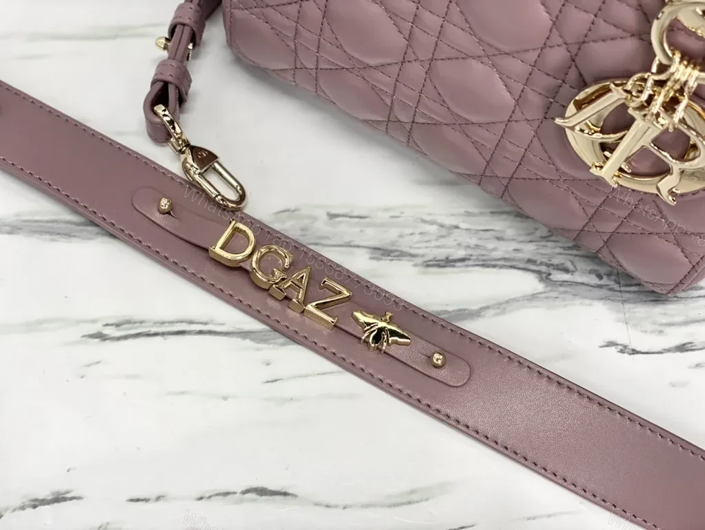 View 3 of Chic Quilted Mini Satchel with Gold Charms - All-Day Versatility