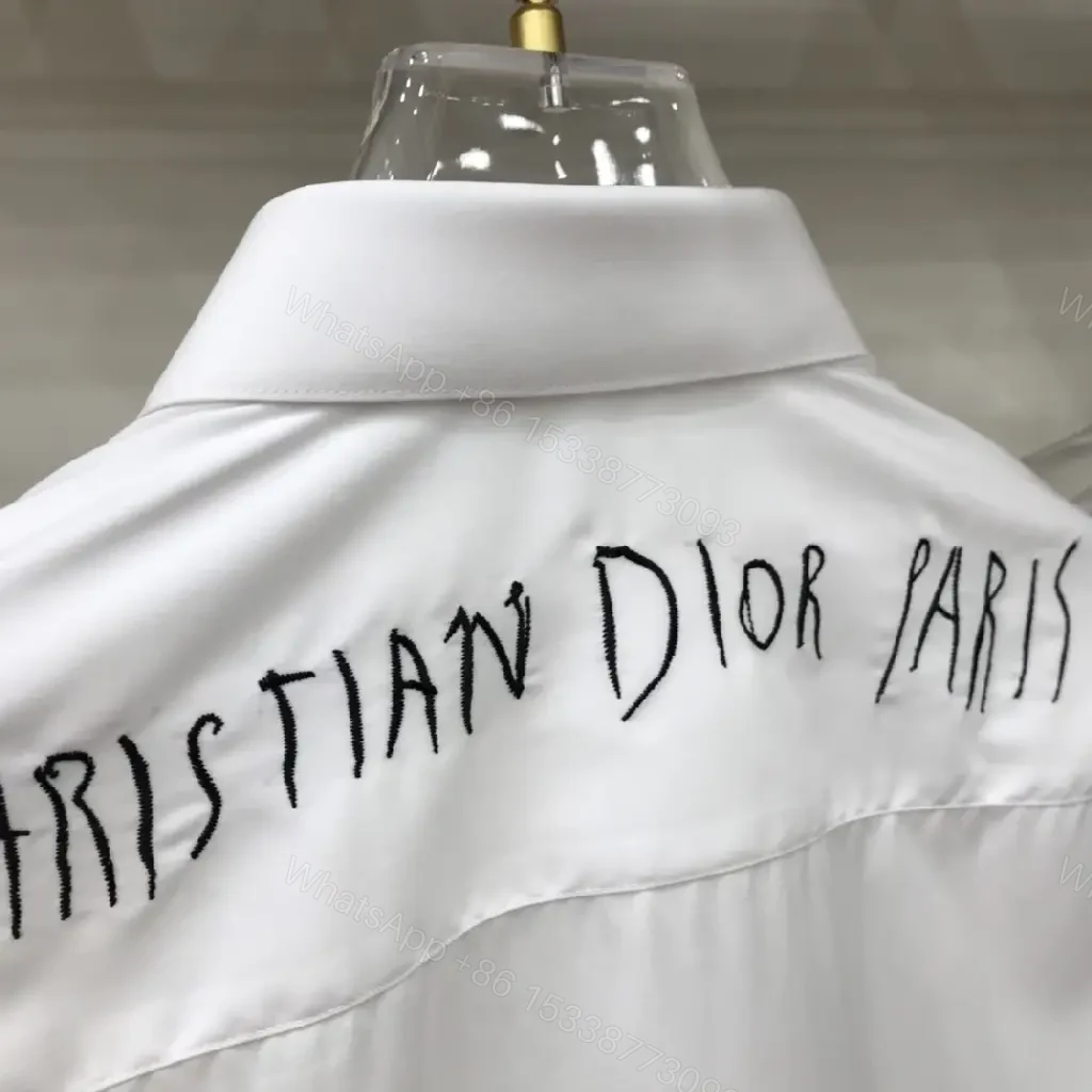 View 3 of White Cotton Shirt with Minimal Dior Emblem, Relaxed Fit, Crisp Look